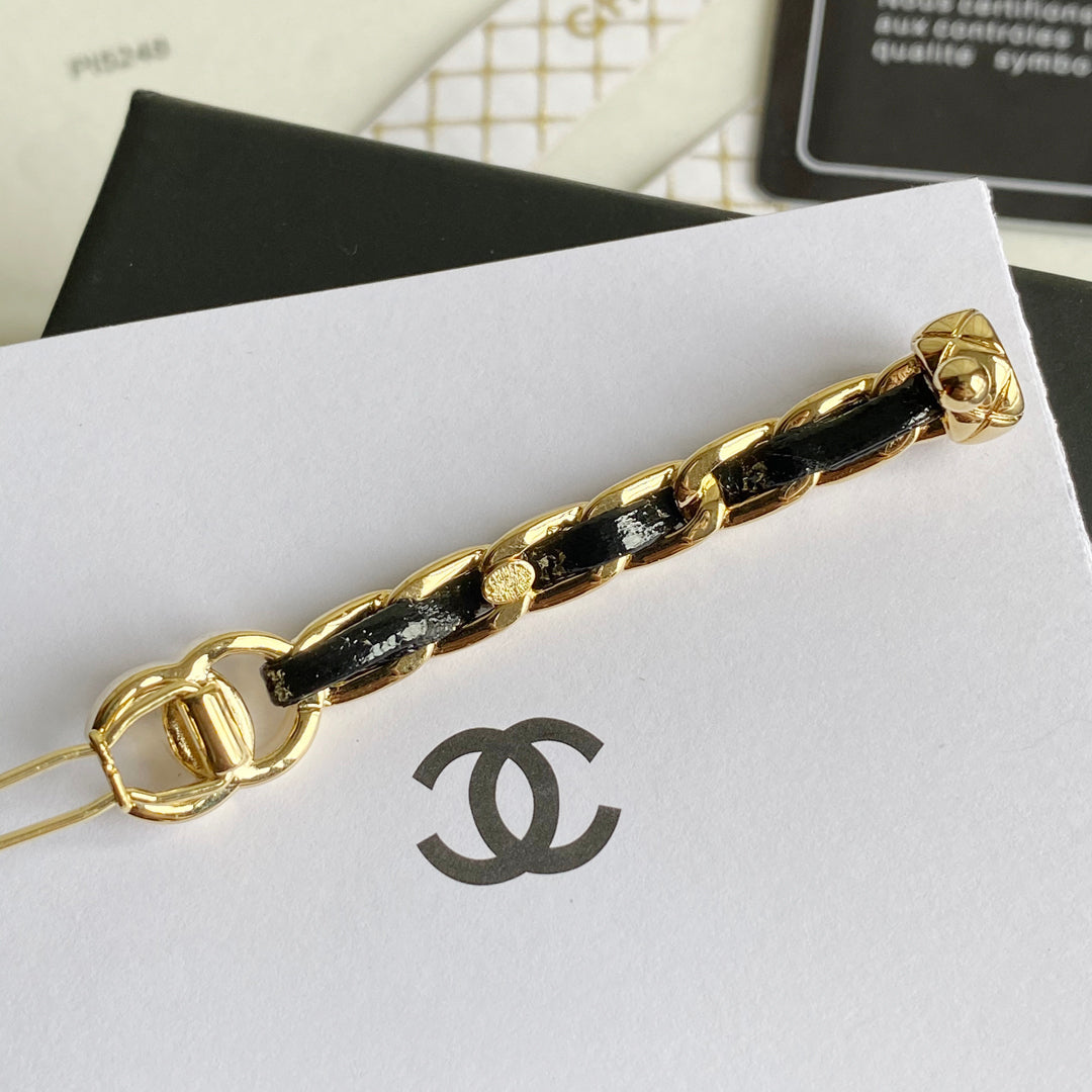 Gold Tone Black Leather Hairpin